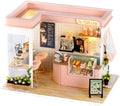 Miniature bubble tea shop dollhouse kit at 1:24 scale with LED lights and resin drinks, a boba cafe build for adults Pink