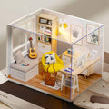 Sunlit modern miniature dollhouse kit with a yellow chair, ukulele and warm LED lighting for shelf or desk display