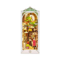 Sunshine Town book nook kit, an LED bookshop diorama that slots between books as a lit shelf insert for adult crafters