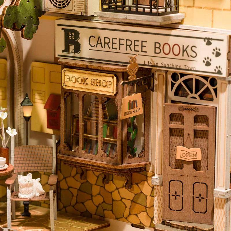 Lit bookshop diorama kit, a birthday or holiday gift for book lovers, cat lovers, and coffee fans who enjoy model building