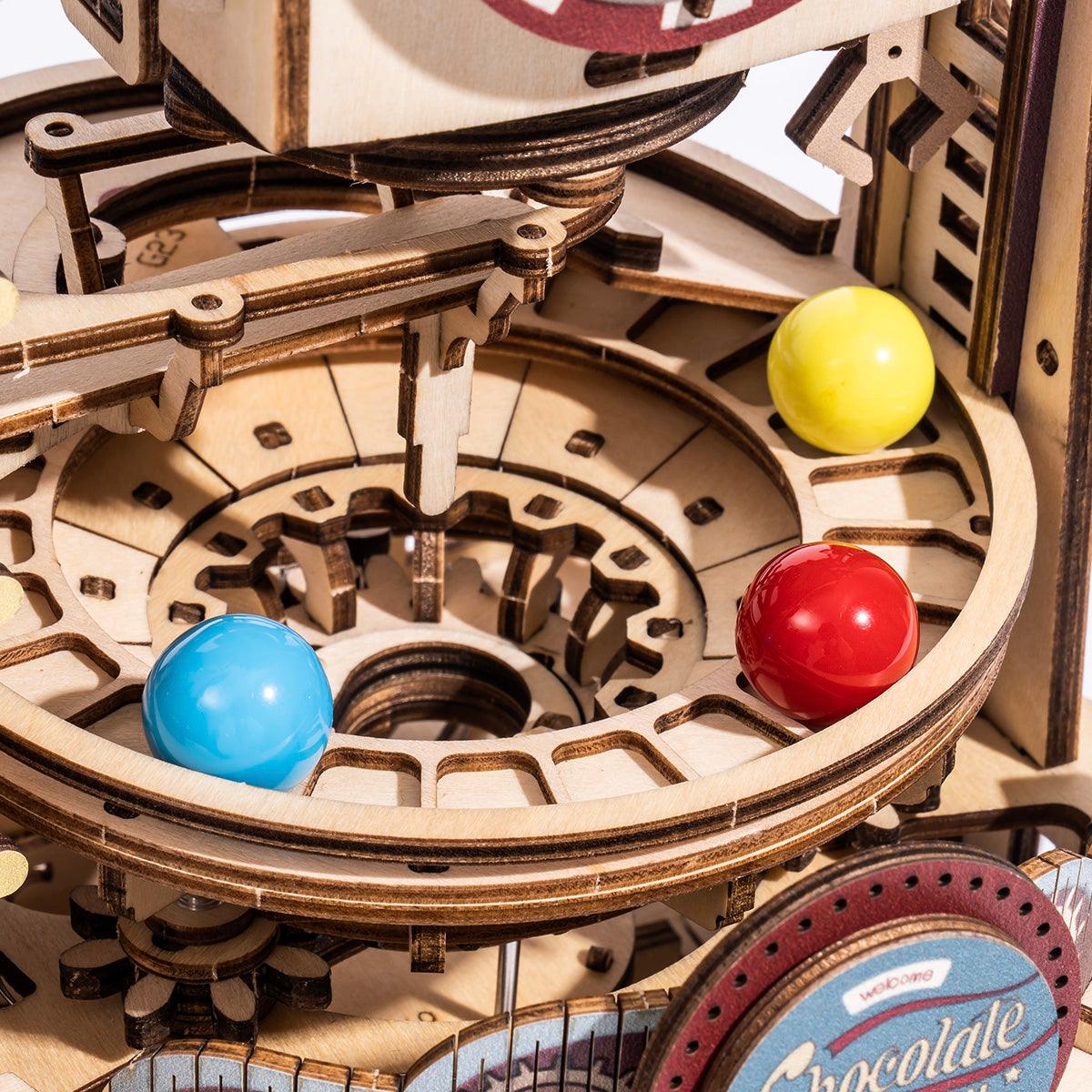 Candy marble machine track carrying colorful marbles through curves, a fidget friendly wooden puzzle and STEM gift for adults