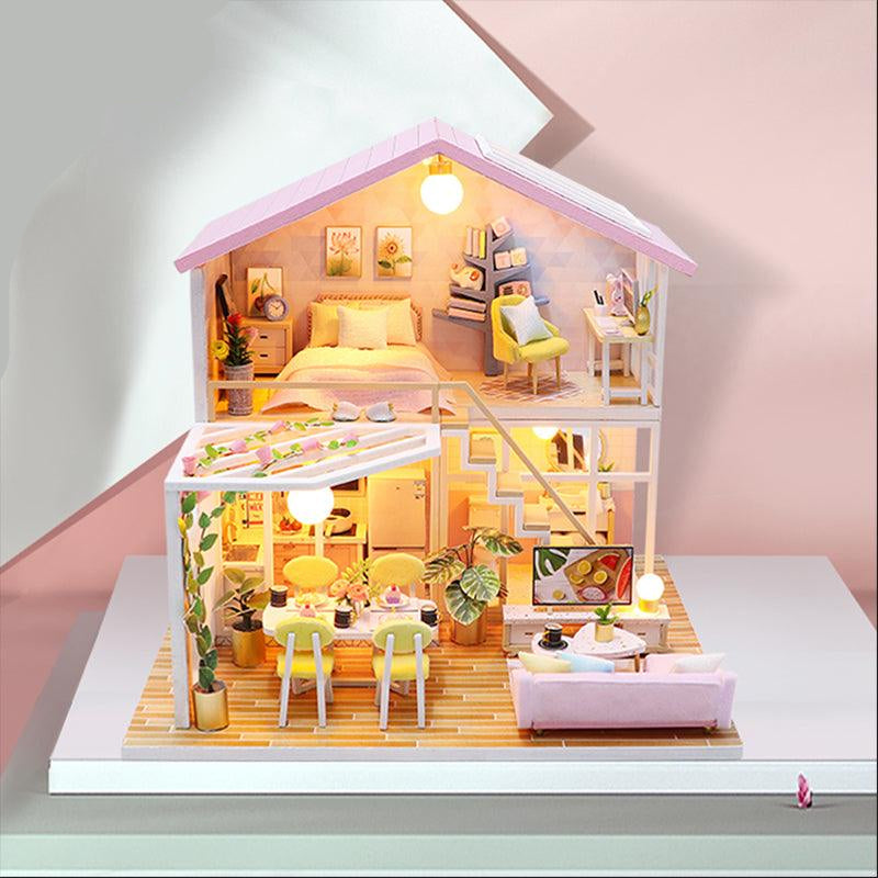 Illuminated 1:24 scale miniature dollhouse kit with furnished pink rooms, an LED lit wooden craft build for adults