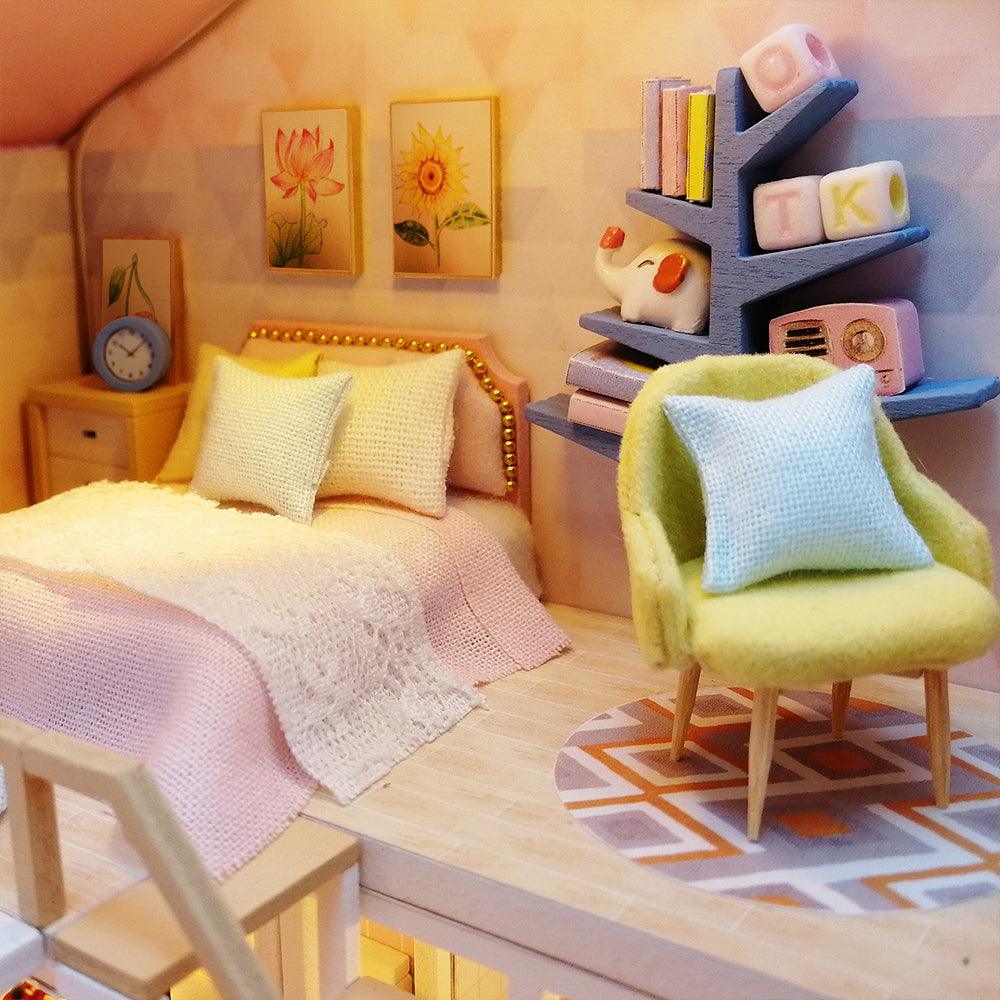 Handcrafted miniature bedroom with a tree bookshelf and botanical wall art, a wooden dollhouse gift for miniature fans