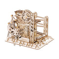 Swingback Explorer wooden marble run kit with 219 laser-cut pieces and 10 marbles, a build-it-yourself STEM model