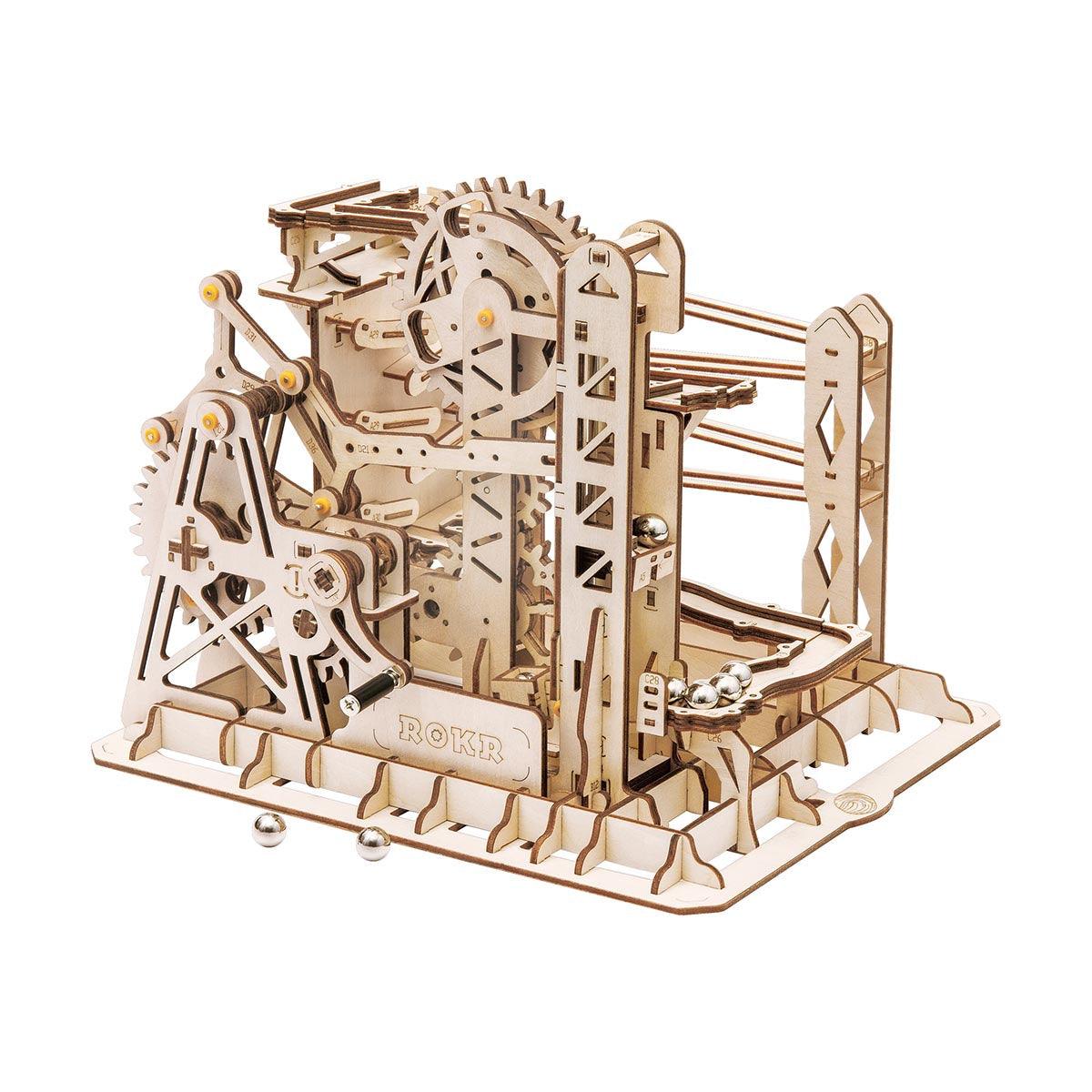 Swingback Explorer wooden marble run kit with 219 laser-cut pieces and 10 marbles, a build-it-yourself STEM model