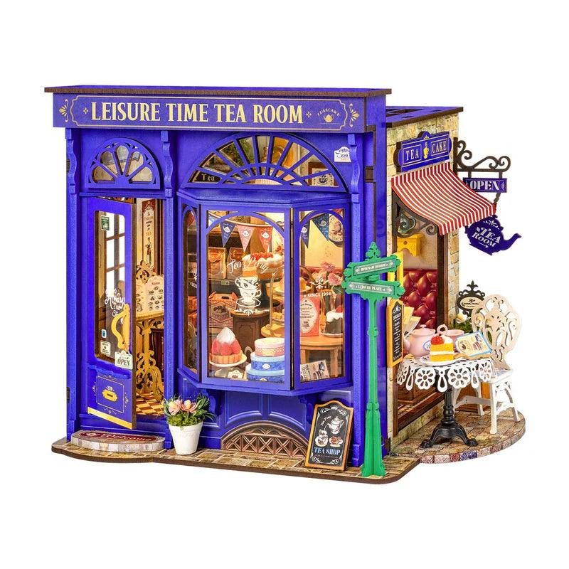 DIY miniature tea room house kit with a blue cafe storefront, a detailed dollhouse model for adult crafters and gifting