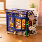 Finished miniature tea shop model as cozy desk and shelf decor, a European cafe dollhouse for tea and coffee lovers