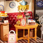 Furnished cafe interior with red leather seating, a set table, and a checkerboard floor for miniature dollhouse fans