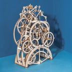 Buildable 3D wooden puzzle clock with a swinging pendulum, laser cut parts assembling into a kinetic mechanical model