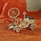 Solar rover that rolls when sunlight hits the panel, a working motor wooden model teaching renewable energy to students
