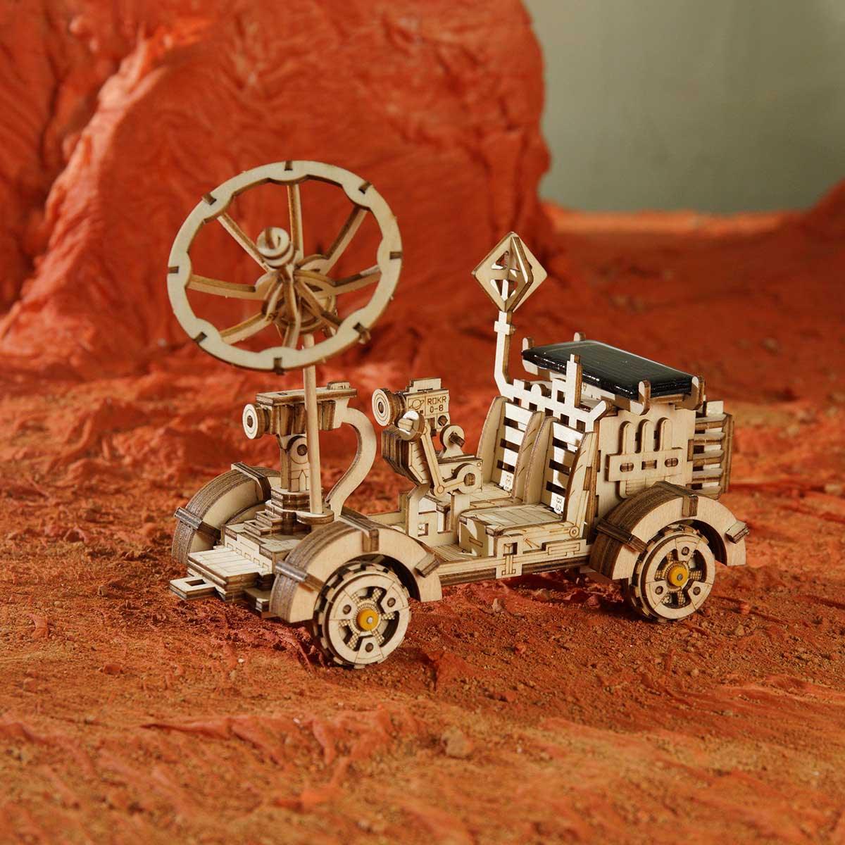 Solar rover that rolls when sunlight hits the panel, a working motor wooden model teaching renewable energy to students