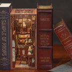 A 1:24 scale DIY book nook that slots between books as a glowing music room diorama and craft gift for hobbyists SZ003