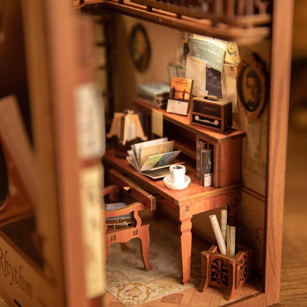 Book nook kit interior with a tiny desk, lamp, and books as a hand-built miniature music study diorama for shelves SZ003