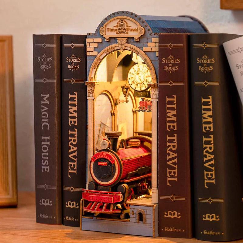 Vintage railway station book nook glowing between real books on a shelf, a lit bookshelf insert for a home library