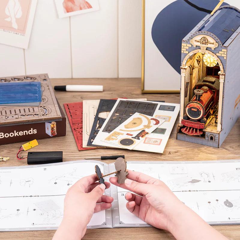 Time Travel Railway book nook building kit with pre-cut parts and instructions, a DIY wooden model project to assemble