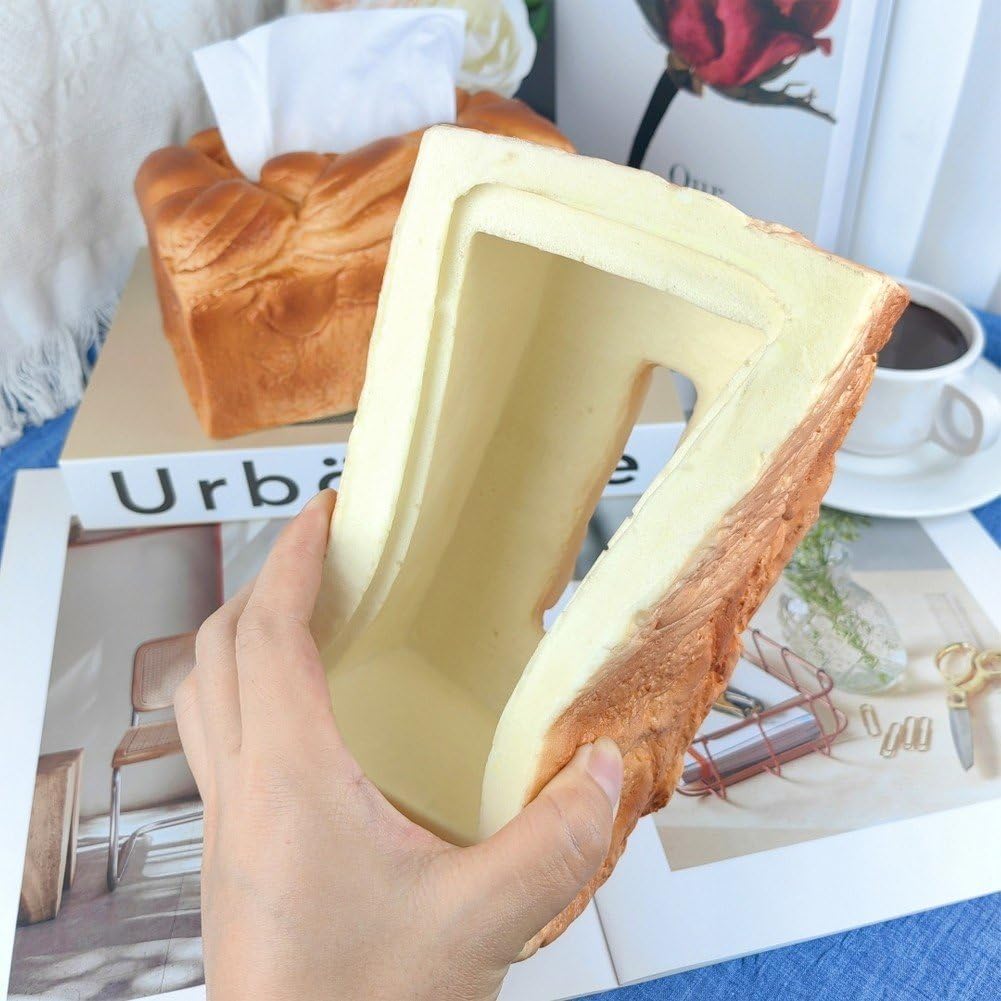 Toast bread tissue holder styled on a dining table with coffee and a magazine as a fun foodie decor accent for guests