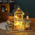 Multi-story tropical resort miniature house lit by LED lights, with furnished rooms and a lush flower garden for adults to build