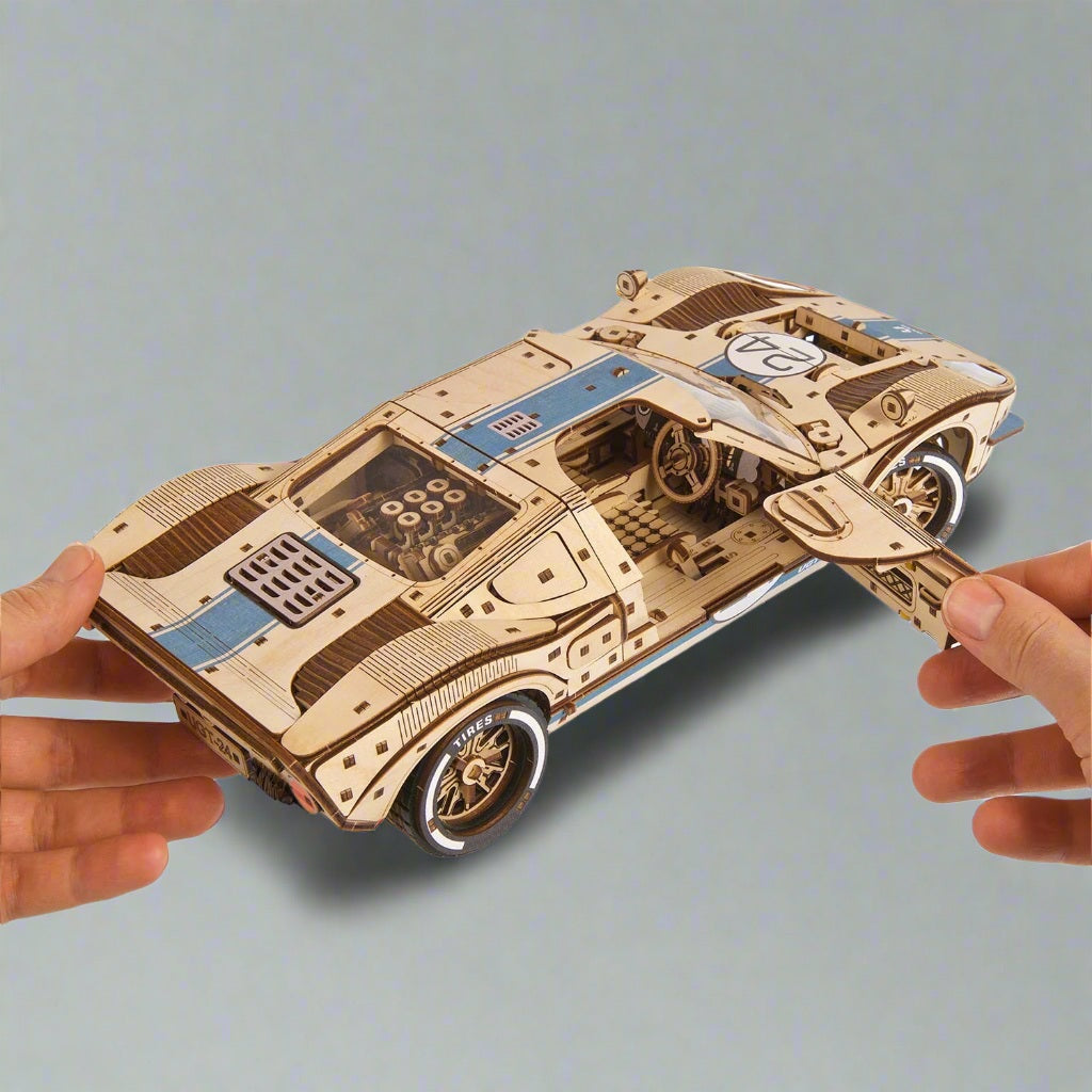 Wooden endurance racer model as a collectible gift for motorsport fans, a laser cut plywood race car kit for shelf and office