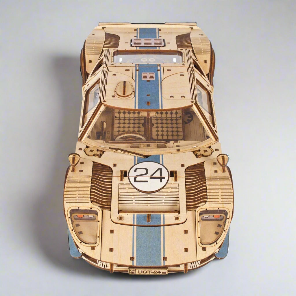 Le Mans style wooden race car with a detailed plywood body and moving parts, an advanced 970 piece model kit for car collectors
