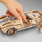 UGT-24 wooden model car styled as a classic endurance racer, an advanced 3D wooden puzzle and shelf display for car enthusiasts