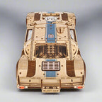 Assembled wooden racer with warm wood grain finish as office and desk decor, a 3D mechanical model car kit for hobby collectors