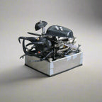 Zinc alloy metal puzzle that builds a detailed beetle with pistons and gears for engineering hobbyists