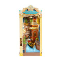 DIY Venice book nook kit with LED lights and gondolas, a lit miniature canal scene that fits between books