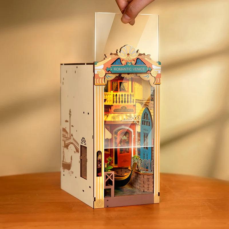 Lit Venetian canal diorama book nook with LED glow, a miniature Italy scene that slides between shelf books