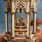Illuminated Victorian pavilion lantern built from 210 wooden pieces, a mechanical music box night light for hobbyists
