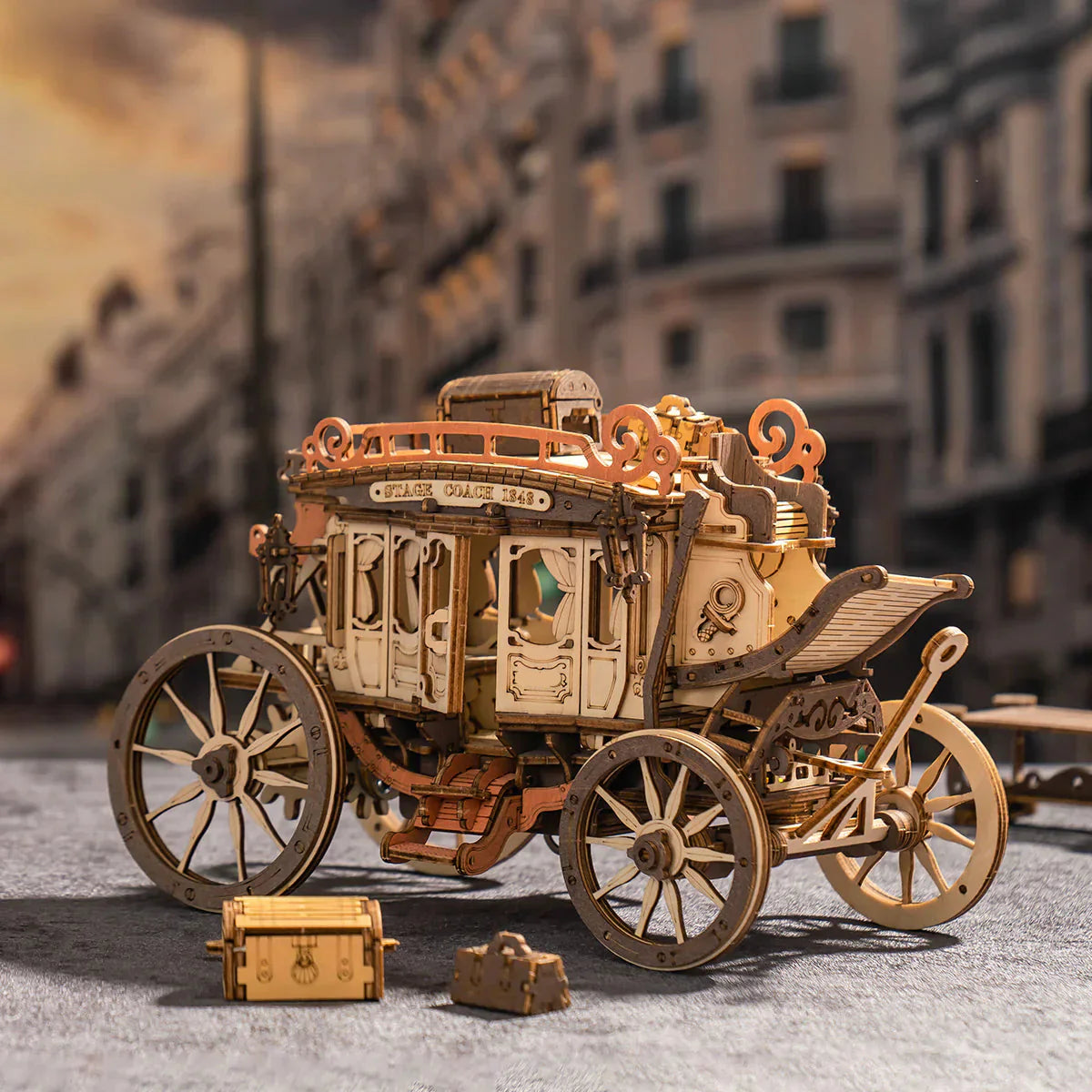 Laser cut wooden stagecoach kit with a moving squirrel passenger, spring driven mechanical music box gift for model builders