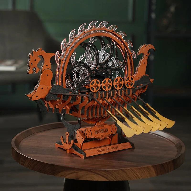 Norse dragon ship wooden model shown as den and shelf decor, a hand-crank mechanical puzzle gift for adult hobby builders