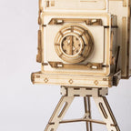 Retro camera wooden model kit with a laser cut lens and folding bellows, an easy no glue build for hobby crafters and teens