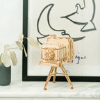 Assembled vintage camera model styled as nostalgic shelf decor, a laser cut wooden puzzle and display piece for any room