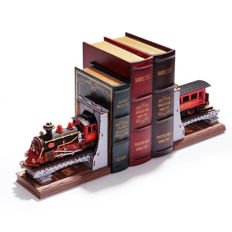 Vintage railway train bookends holding a row of books, a DIY wooden steam locomotive and carriage set for book lovers