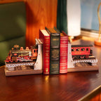 Wooden train bookends styled on a reading desk, a vintage steam engine book end set that frames books as a shelf accent