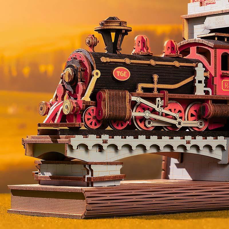 Detailed steam locomotive book end with gold trim and spoked wheels, a handcrafted wooden railway model for desk decor