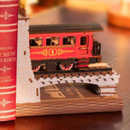 Red passenger carriage book end on a laser cut bridge, a vintage railway train set and gift for train enthusiasts