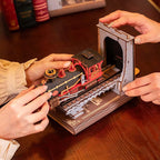 Assembling the wooden train bookend kit by hand with bayonet locking parts, a tool free 3D puzzle craft for hobbyists
