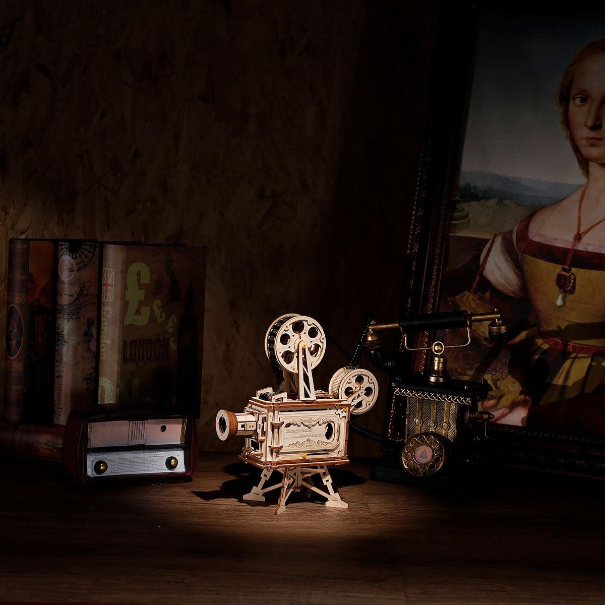 Hand crank generator movie projector with mechanical gears and a projection light, a no battery wooden model kit for a desk