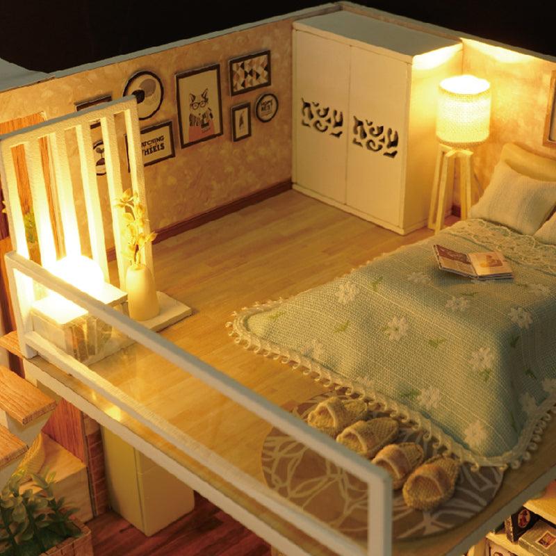 Handmade roombox kit with nostalgic decor and a warm LED glow, a relaxing craft project and gift idea