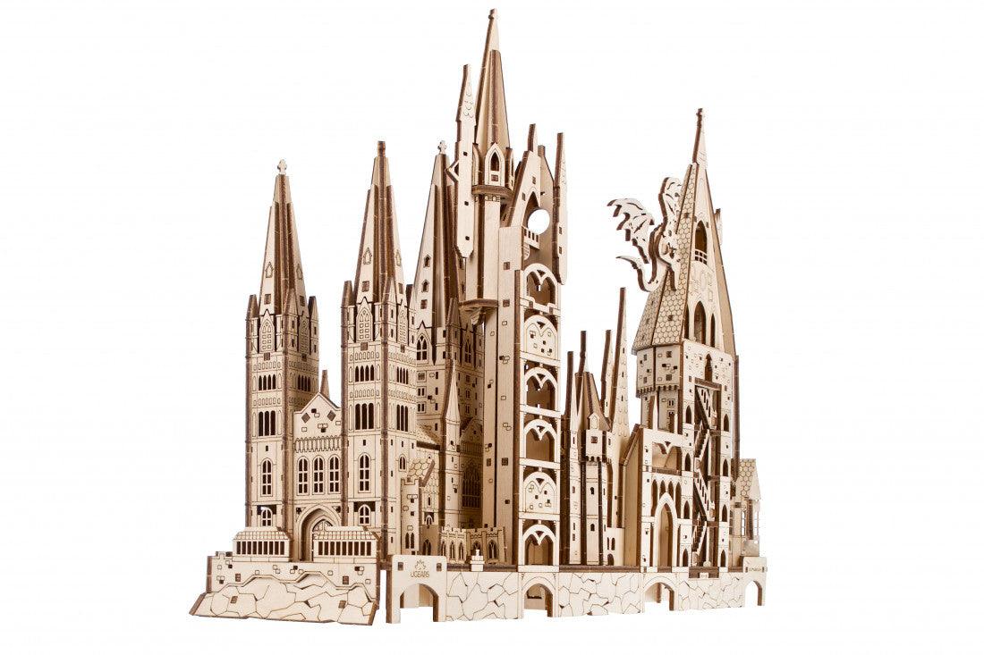 Wooden wizard castle puzzle with stonework towers and a cutaway view, a fantasy display piece for shelves