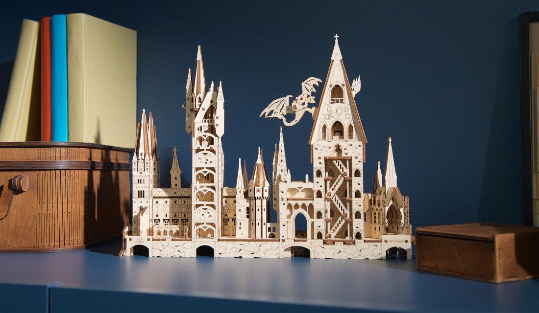 340 piece laser-cut wooden castle kit with a perched dragon, a no glue fantasy model for shelves and desks