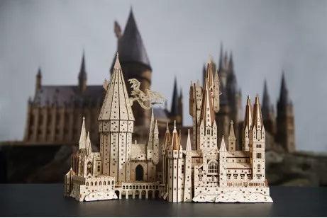 Wizard castle wooden model with interior room detail and moving dragon, a screen-free hobby kit for adults