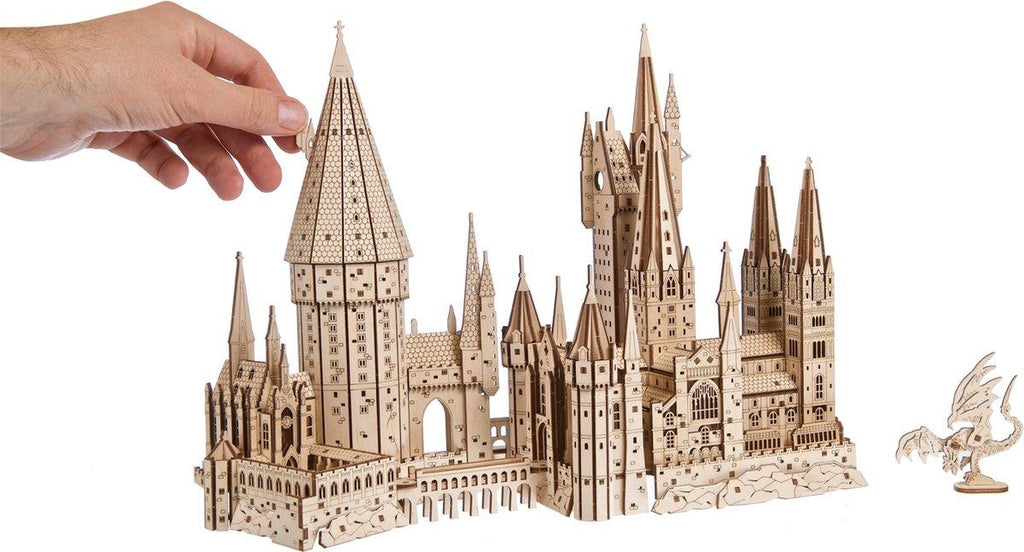 Detailed fantasy castle puzzle in composite wood with turrets and spires, a display model for puzzle lovers