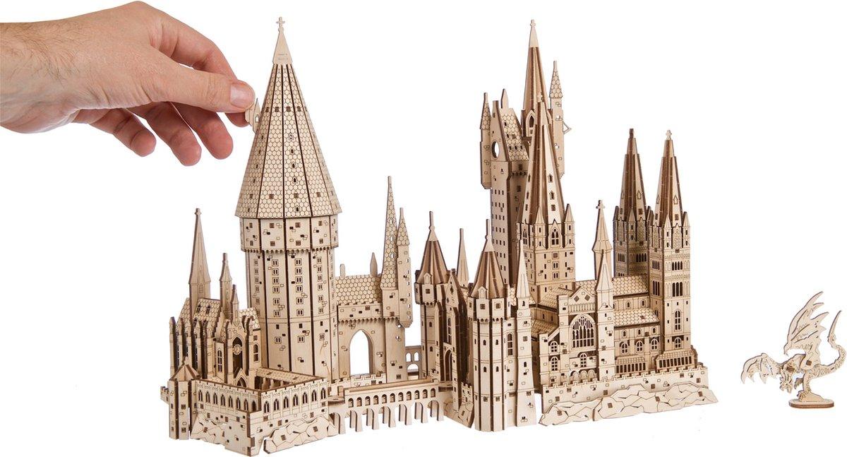 Detailed fantasy castle puzzle in composite wood with turrets and spires, a display model for puzzle lovers