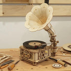 Hand-crank wooden turntable that also runs on micro USB, a working record player build for vintage home decor fans