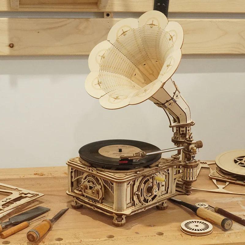 Hand-crank wooden turntable that also runs on micro USB, a working record player build for vintage home decor fans