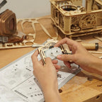 Vintage gramophone model kit with three speed control, playing classic vinyl records as a gift for adult builders