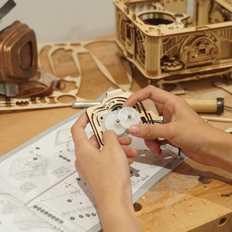 Vintage gramophone model kit with three speed control, playing classic vinyl records as a gift for adult builders