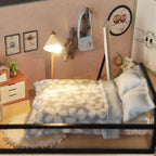 Handcrafted miniature bedroom with floral bedding and a reading lamp, a wooden dollhouse gift for miniature fans